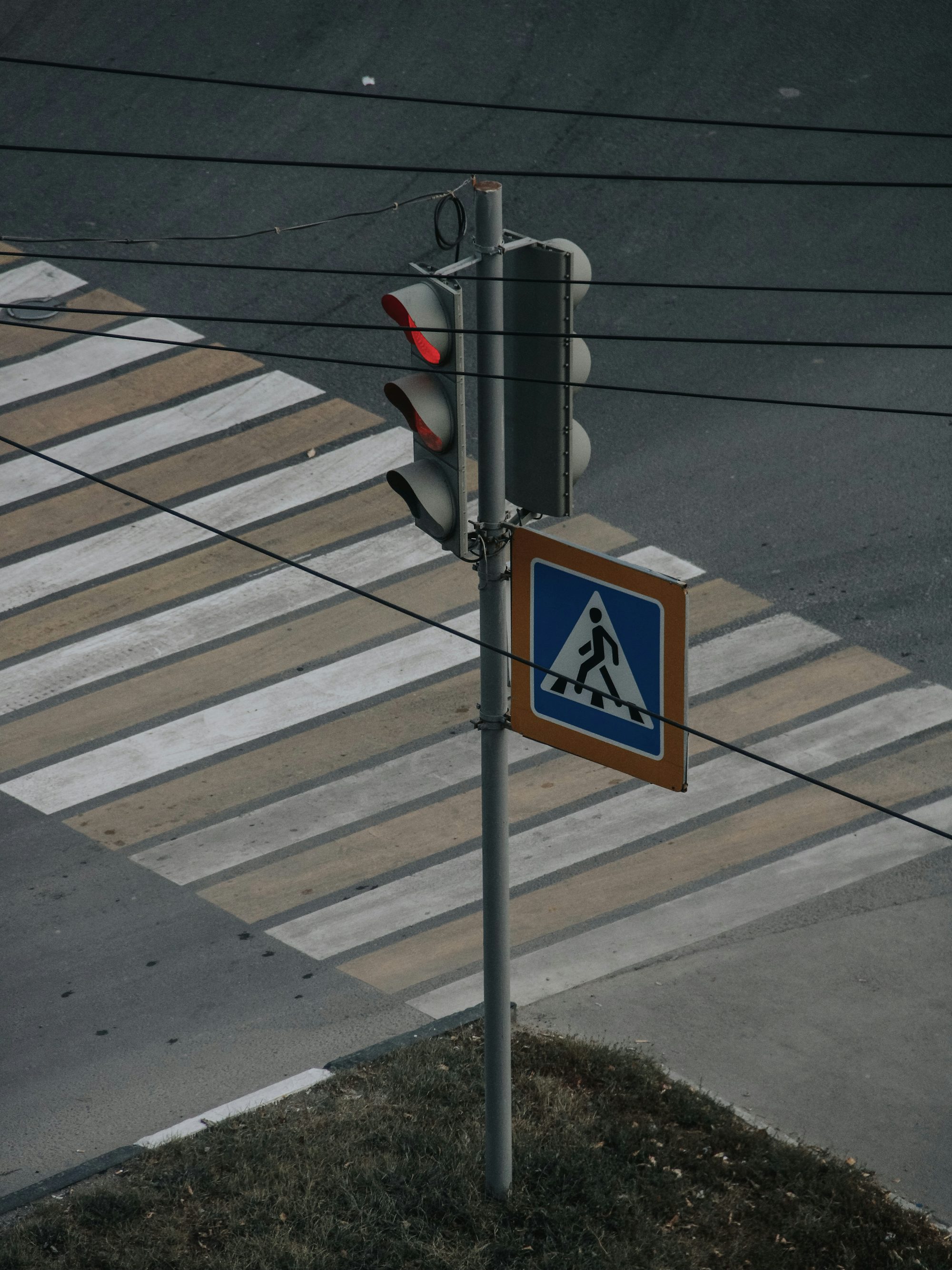 blue and white pedestrian road sign